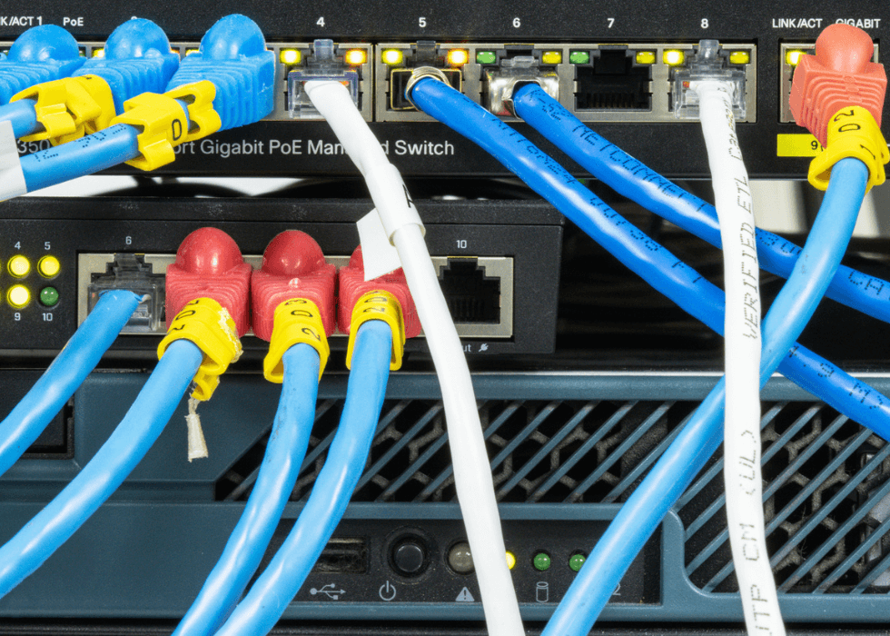 PoE_switch Network hub with LAN cable connected to patch cables connected to internet data center